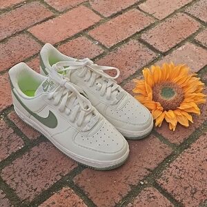 Nike Low-Top Sneakers — Cream with Olive Green Swoosh